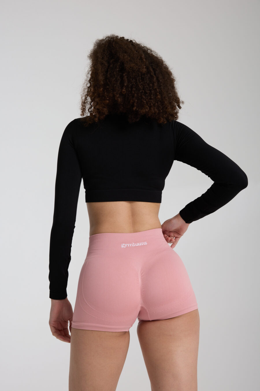 GYMHAMS Drop Shorts Pembe Kalça Büzgülü Süper Mini Şort – Push-up Toparlayıcı & Şekillendirici
